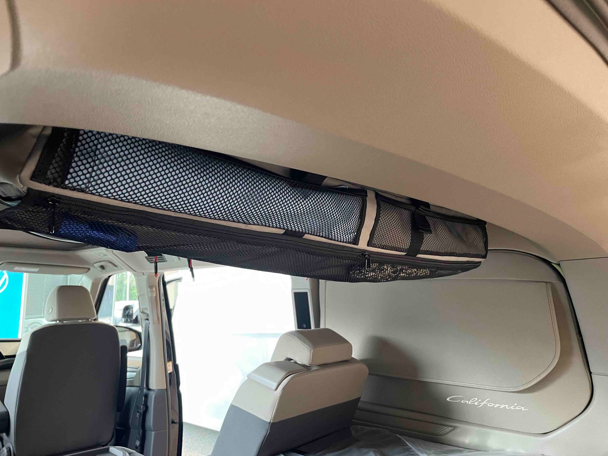 Dachschrank, Stauraum, California T7, Fenstertaschen, VW der neue California,
Zubehoer fuer New California, Zubehoer fuer New Multivan, der neue Haken fuer den neuen California Dachschrank, Zubehoer fuer den neuen California - jetzt kaufen. Zubehör für T7. Stauraum für T7, Reisekofer für T7